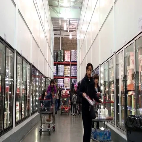 One side of people shopping inside Costco store Stock Footage 69700707