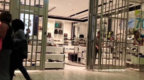 One side of shoes store Stock Footage 52494265