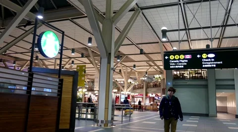 One side of Starbucks inside inside YVR airport in Vancouver BC Canada Stock Footage 60248814