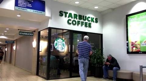 One side of Starbucks store inside shopping mall with 4k resolution Stock Footage 67262719