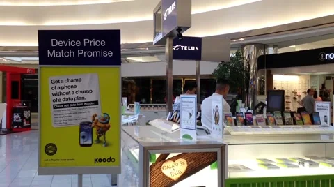 One side of telus sales booth inside shopping mall Stock Footage 52453629