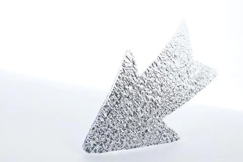One silver paper arrow isolated on white Foto stock