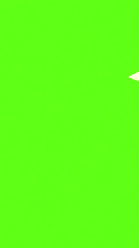 One single white paper falling on vertical chroma key green screen Stock Footage 312160435
