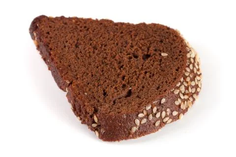 One slice of black bread with sesame seeds isolated on white background Stock Photos