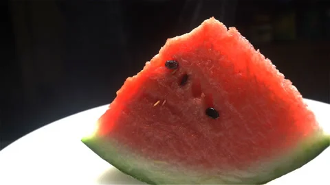 One slice of watermelon rotated Video stock 93018203