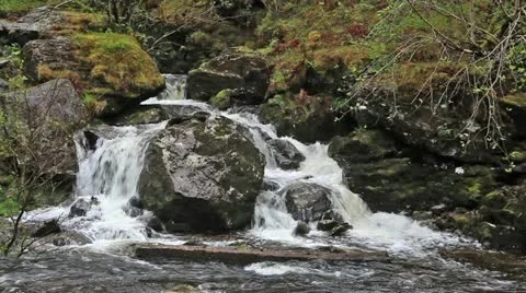 One of the smaller falls of the falls of Falloch in Scotland Stock Footage 11297809