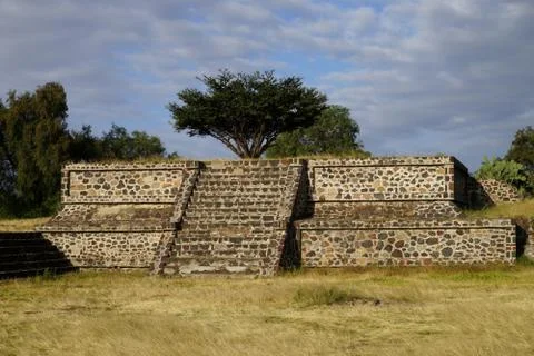 One of the smaller pyramids with a tree growing on the top in Teotihuacan, Me Stock Photos