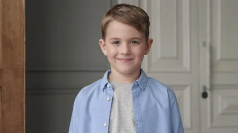 One Smiling Boy with Casual Clothes Looking at Camera Close-up in Domestic Inter Stock Footage 199476659