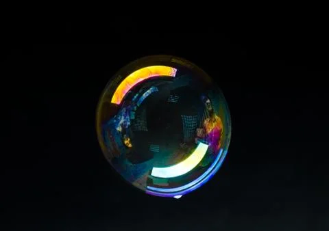 One soap bubbles isolated on black background. Stock Photos