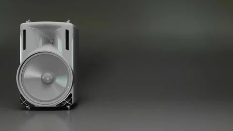 One speaker system on the left with two speakers on a gray background Stock Footage 283555703