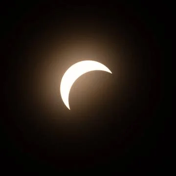 One of the stages of 2024 solar eclipse Early stage of the solar eclipse i... Stock Photos