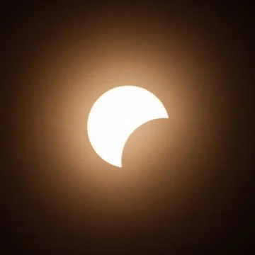One of the stages of 2024 solar eclipse Early stage of the solar eclipse i... Fotos Stock