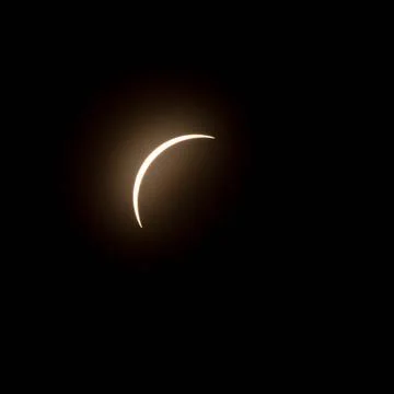 One of the stages of 2024 solar eclipse Final stage of the solar eclipse i... Stock Photos