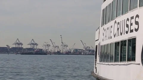 One Statue of Liberty ferry passes another, seen from Liberty Island. Stock Footage 81007250