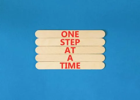 One step at a time symbol. Concept words One step at a time on beautiful wo.. 写真素材