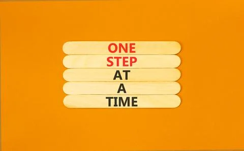 One step at a time symbol. Concept words One step at a time on beautiful wo.. 写真素材