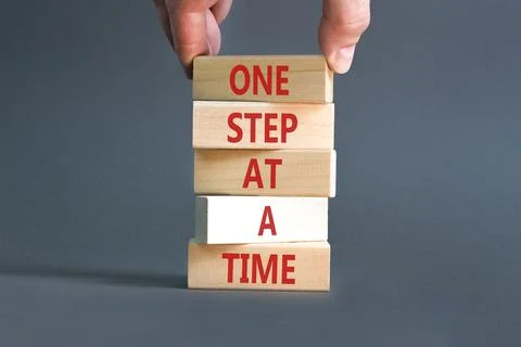 One step at a time symbol. Concept words One step at a time on beautiful wo.. 写真素材
