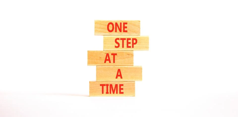 One step at a time symbol. Concept words One step at a time on beautiful wo.. 写真素材
