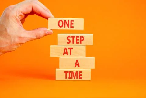 One step at a time symbol. Concept words One step at a time on beautiful wo.. 写真素材