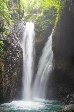 One stream of Gitgit Waterfall in Bali, Indonesia Stock Photos