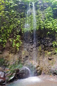 One stream of Gitgit Waterfall in Bali, Indonesia Stock Photos