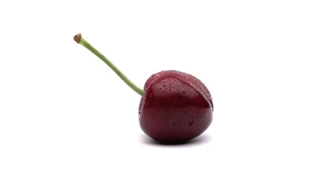 One sweet cherry is rotating on the white background. Stock Footage 157817418