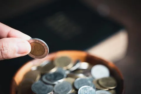 One tenth or tithe is basis on which Bible teaches us to give one tenth of fi Stock Photos