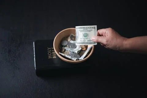 One tenth or tithe is basis on which Bible teaches us to give one tenth of .. Stock Photos