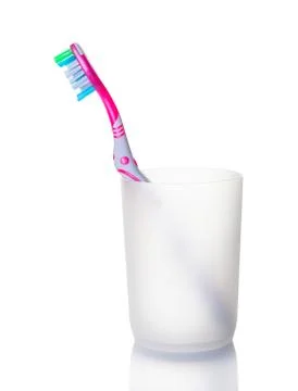 One toothbrushe in a glass Stock Photos