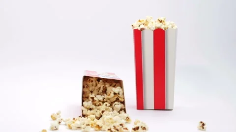 One of two boxes of popcorn falls 库存影片 151923069