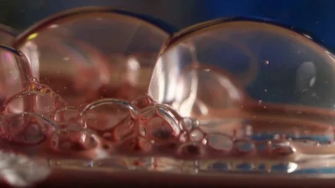 One of Two Bubbles Pops Slo-Mo Stock Footage 75559503