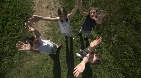 One, two, three sports greeting kids group in slow motion by Sheyno, crane shot. Stock Footage