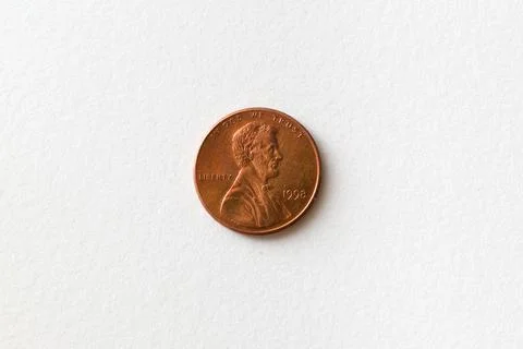 One US dollar cent coin with the image of Abraham Lincoln. Stock Photos