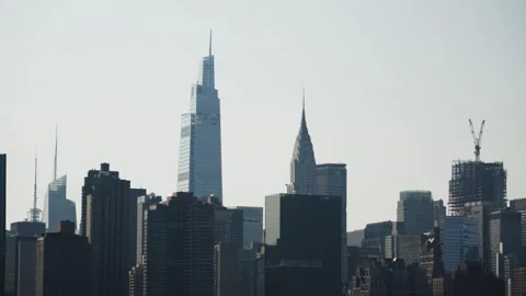 One Vanderbuilt and the Chrystler Tower viewed from across the East River fr Stock Footage 243811421