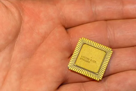 One vintage ceramic CPU in the hand Stock Photos