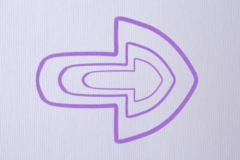 One violet arrow on light grey textured background. Pointer Stock Photos