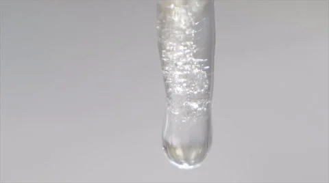 One Water Drop Falling Down From Icicle - Slowmotion Extreme Closeup Stock Footage 36665537
