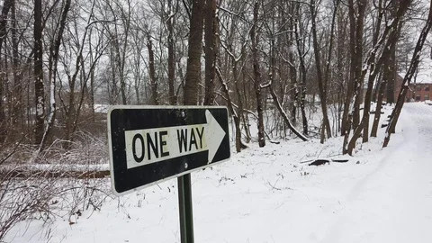 One Way sign in Snowfall Stock Footage