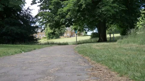 One way system walk towards a big beautiful building on a hill Video stock 133201805