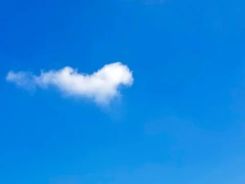 One white cloud in blue sky Stock Photos