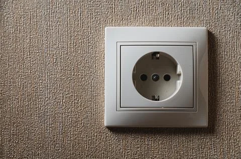 One white electrical socket at home. Close-up Stock Photos