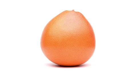 One whole grapefruit is rotating on white background. Video stock 159002342