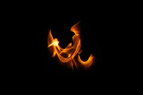 One wing in flame. Wings in Flame and Fire. Black background. Copy space. Out of Stock Photos