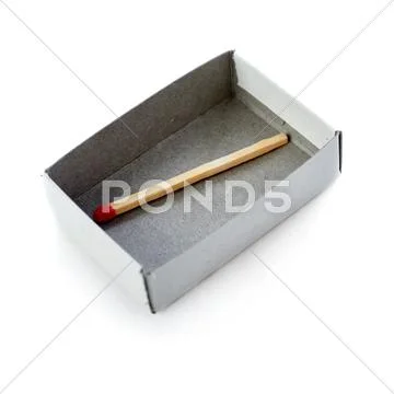 One Wooden match in box isolated over the white background Stock Photos