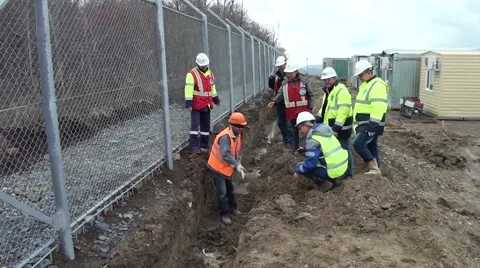 One Worker Digs A Trench Stock Footage 58030723