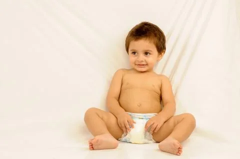 One year old boy in nappy resting on white background of cloth MR#686O 29-J.. 스톡 사진
