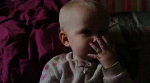 One year old eating grapes Stock Footage 12760598