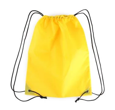 One yellow drawstring bag isolated on white Stock Photos