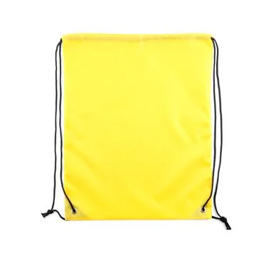 One yellow drawstring bag isolated on white Stock Photos