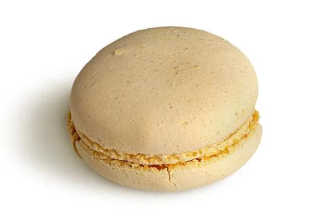 One yellow macaroon angled view Stock Photos